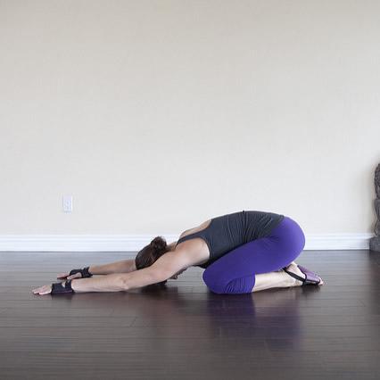 12 Yoga Poses for Back Pain for Real Relief | YouAligned.com